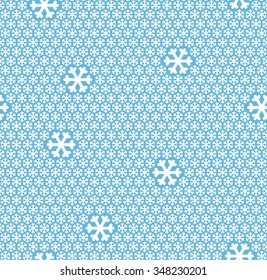 white snow flakes on blue colored seamless background