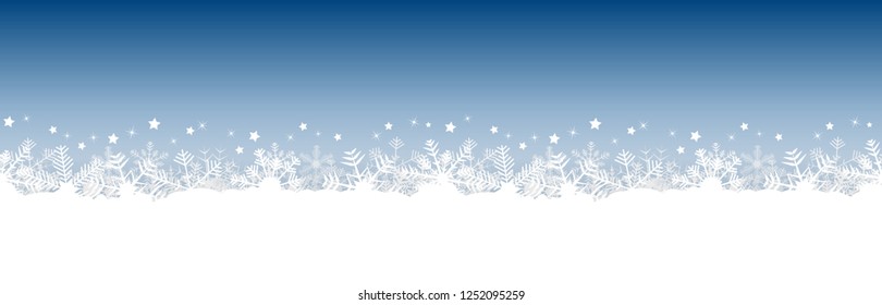 white snow flakes on bottom side and blue colored christmas background