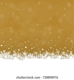 white snow flakes on bottom side and golden colored background