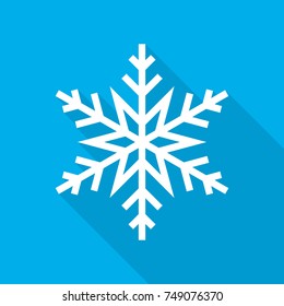 White snowflake icon. Abstract snowflake with long shadow on blue background in flat design. Vector illustration.