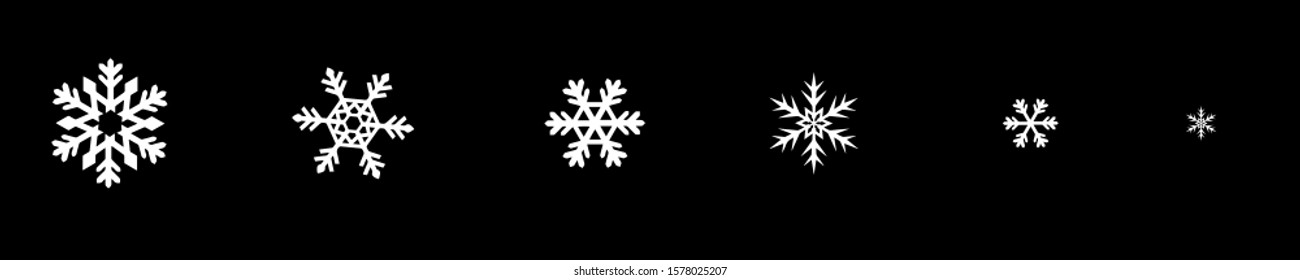 White snowflake on a black background. Isolated snowflakes collection. Frosty background.