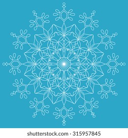 White  snowflake on blue winter background. Vector illustration  snowflake. Decorative element.  Lacy round ornament.