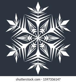 White snowflake on a dark gray background. New Year element. Winter decor