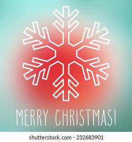 White snowflake over square abstract smooth blur background with hand written Christmas greetings.