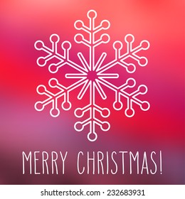 White snowflake over square abstract smooth blur background with hand written Christmas greetings.