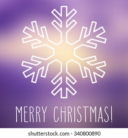 White snowflake over square abstract smooth blur background with hand written Christmas greetings.
