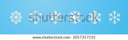 White snowflake set on blue gradient