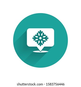 White Snowflake with speech bubble icon isolated with long shadow. Merry Christmas and Happy New Year. Green circle button. Vector Illustration