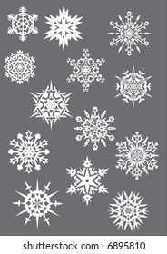 colección de copos de nieve blancos sobre fondo gris