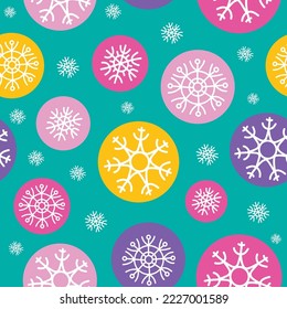 Copos de nieve blancos en burbujas coloridas sobre fondo verde. La Navidad y el año nuevo son un patrón sin fisuras. Para papel textil, embalaje, embalaje.