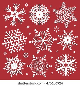 White snowflakes icon on red background. Collection graphic art for your design Merry Christmas and Happy New Year
