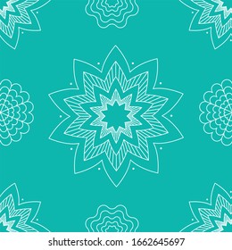 White snowflakes or mandala frost patterns on turquoise background seamless