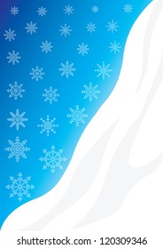 White snowflakes on the background of the winter sky