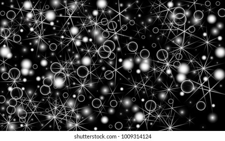 White Snowflakes on Black Background. Christmas Confetti. Festive Background with Bokeh and Stars. New Year Glitter made of Snowflakes and Stars. Confetti for Cards, Posters, Flyers on Black Backdrop.