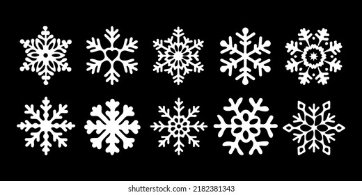 White Snowflakes on a black background. Isolated elements in a flat style. Stylish set for your New Year or Christmas design. Vector illustration.	
