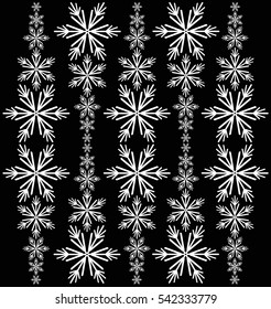 White snowflakes on a black background