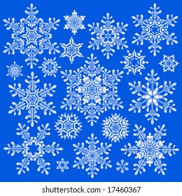 copos de nieve blancos con fondo azul