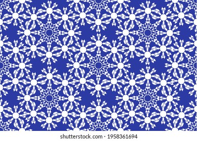 White snowflakes on a blue background. Background.