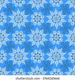 White snowflakes on a blue background. New Year and Christmas pattern for textiles, fabrics, backgrounds, pajamas, packaging paper, wallpaper, fabric, covers.