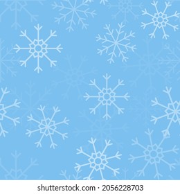 White snowflakes on blue background seamless pattern. 
Christmas seamless pattern of falling snowflakes in white grey colors with bokeh effect.