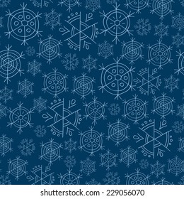White  snowflakes on blue background seamless pattern