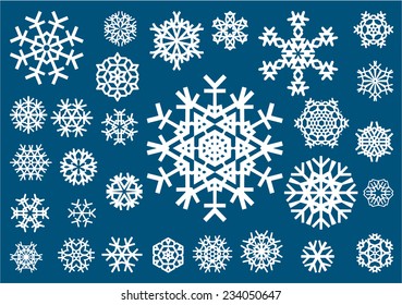 White snowflakes on a blue background. Vector illustration
