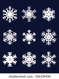 white snowflakes on a blue background, vector