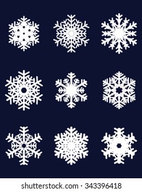 white snowflakes on a blue background, vector