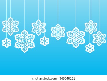 White snowflakes on blue background
