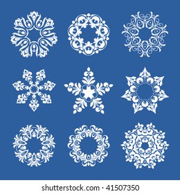 White snowflakes on a blue background