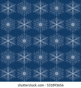 White snowflakes on a blue background