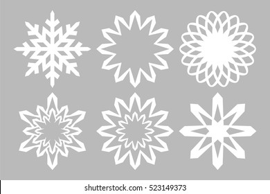 White snowflakes on gray background. Merry Christmas and Happy New Year 2020. Creative winter
