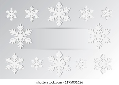 white snowflakes on the grey background