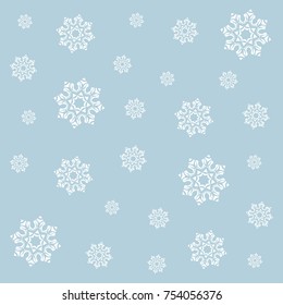 White snowflakes on a light blue background. Vector