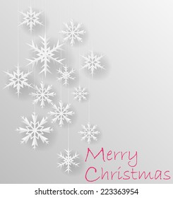 white snowflakes on white paper 