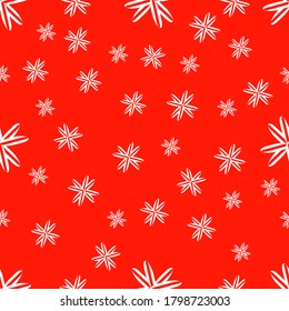 Copos de nieve blancos en un fondo rojo. Patrón sin foco. Tema y tiempo de Navidad. Textura de Año Nuevo. Papel tapiz, postales, textiles y diseño.
