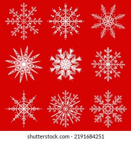 White snowflakes on the red background. Seamless pattern.