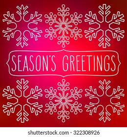 White snowflakes over red square abstract smooth blur background with hand written season's greetings in a frame.
