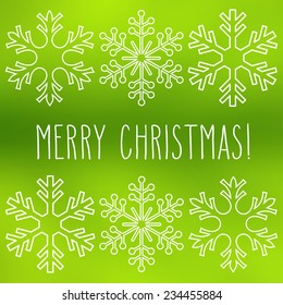 White snowflakes over square abstract smooth blur background with hand written Christmas greetings.