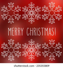 White snowflakes over square abstract smooth blur background with hand written Christmas greetings.
