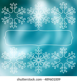 White snowflakes over square abstract blue smooth blur background with empty frame for your text.