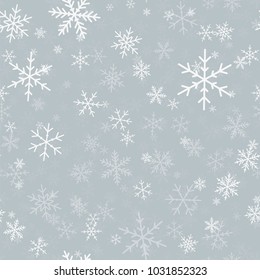 White snowflakes seamless pattern on light grey Christmas background.