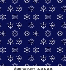 White snowflakes seamless pattern on blue. Winter festive background. Vector illustration.