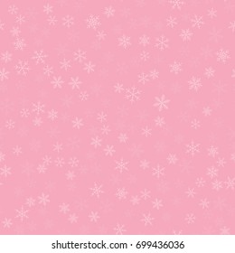 White snowflakes seamless pattern on pink Christmas background.