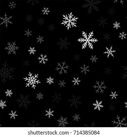 White snowflakes seamless pattern on black Christmas background.