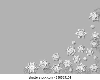White snowflakes with shadow on grey background