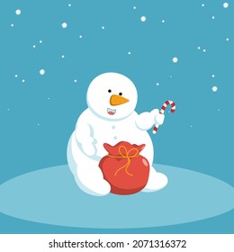 White snowman sits with red christmas bag and lollipop in hand.