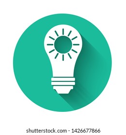 White Solar energy panel icon isolated with long shadow. Sun and light bulb. Green circle button. Vector Illustration