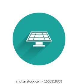 White Solar energy panel icon isolated with long shadow. Green circle button. Vector Illustration