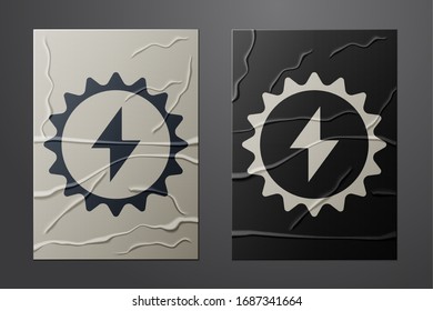 White Solar energy panel icon isolated on crumpled paper background. Sun with lightning symbol. Paper art style. Vector Illustration